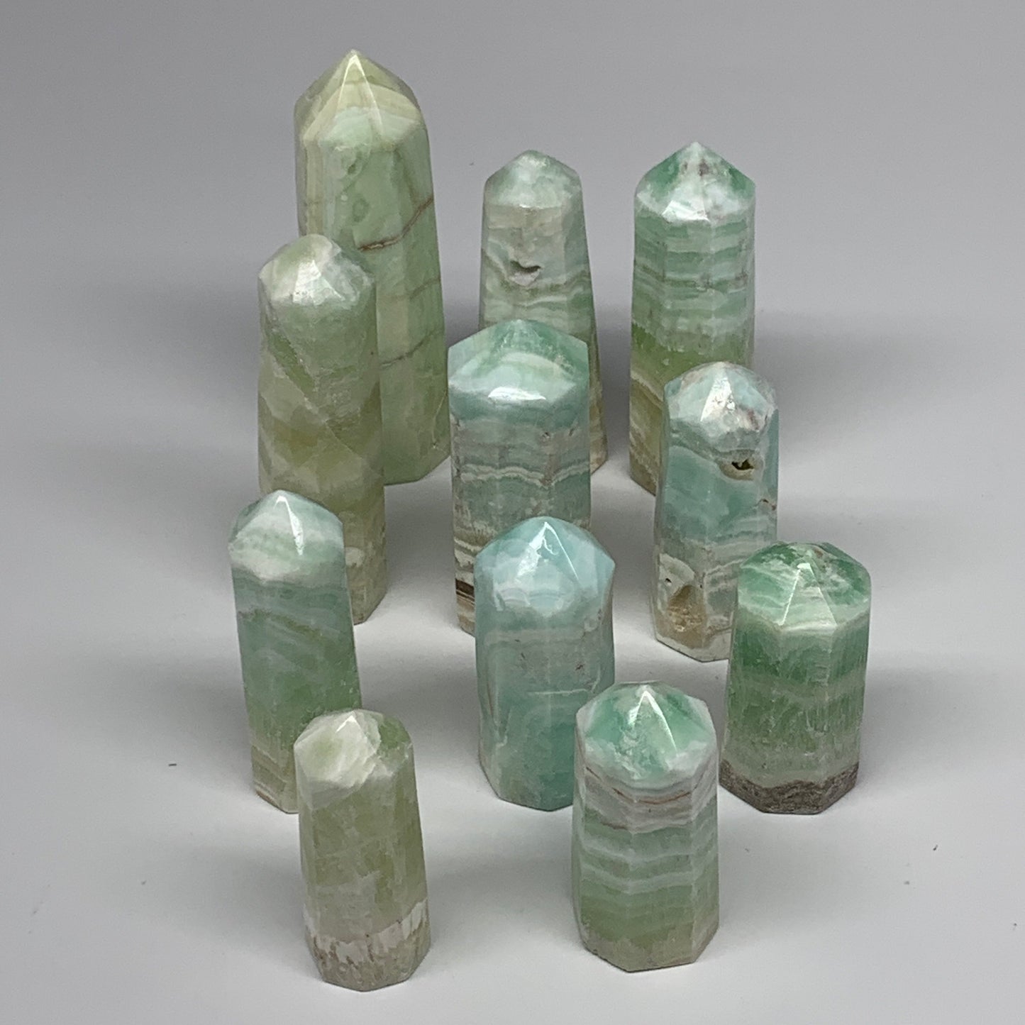 2.25 lbs, 2.2" - 4", 11 pcs, Caribbean Calcite Towers/Obelisks, B26380