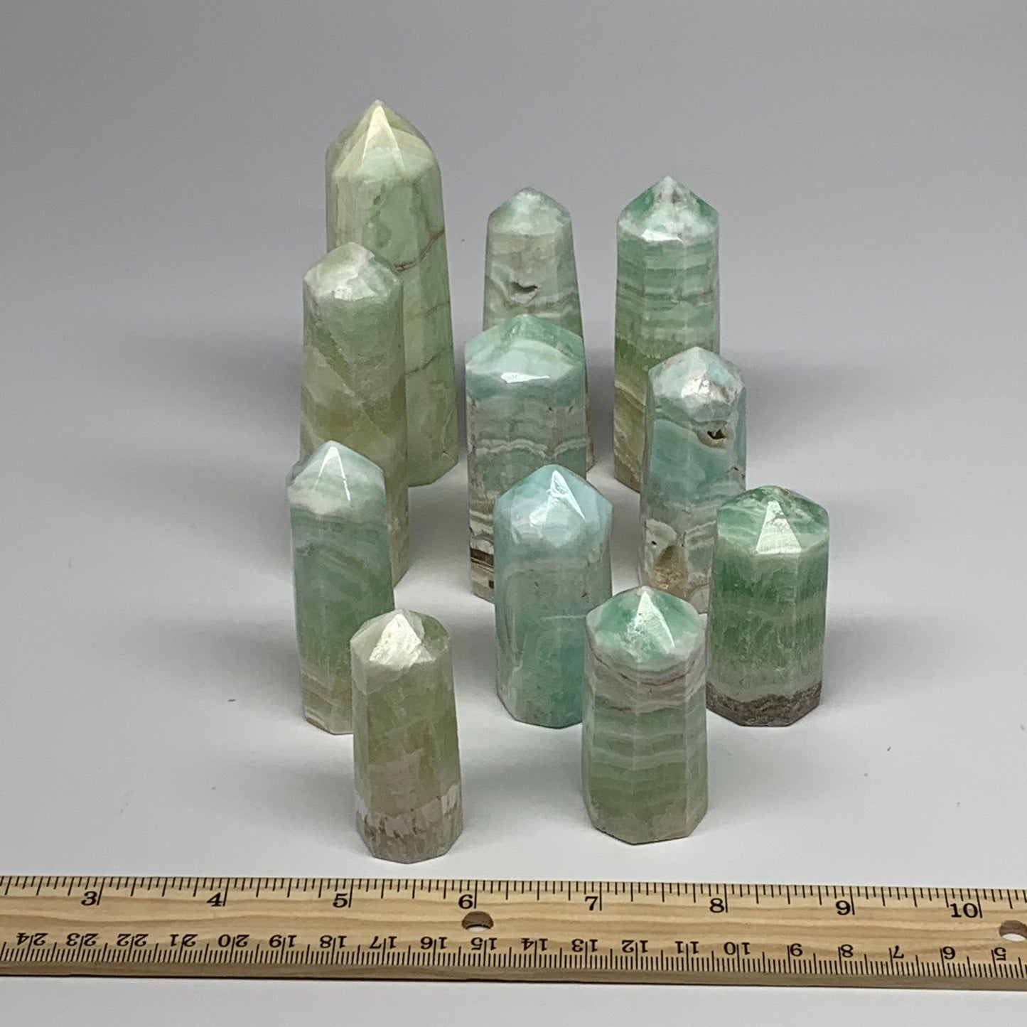 2.25 lbs, 2.2" - 4", 11 pcs, Caribbean Calcite Towers/Obelisks, B26380