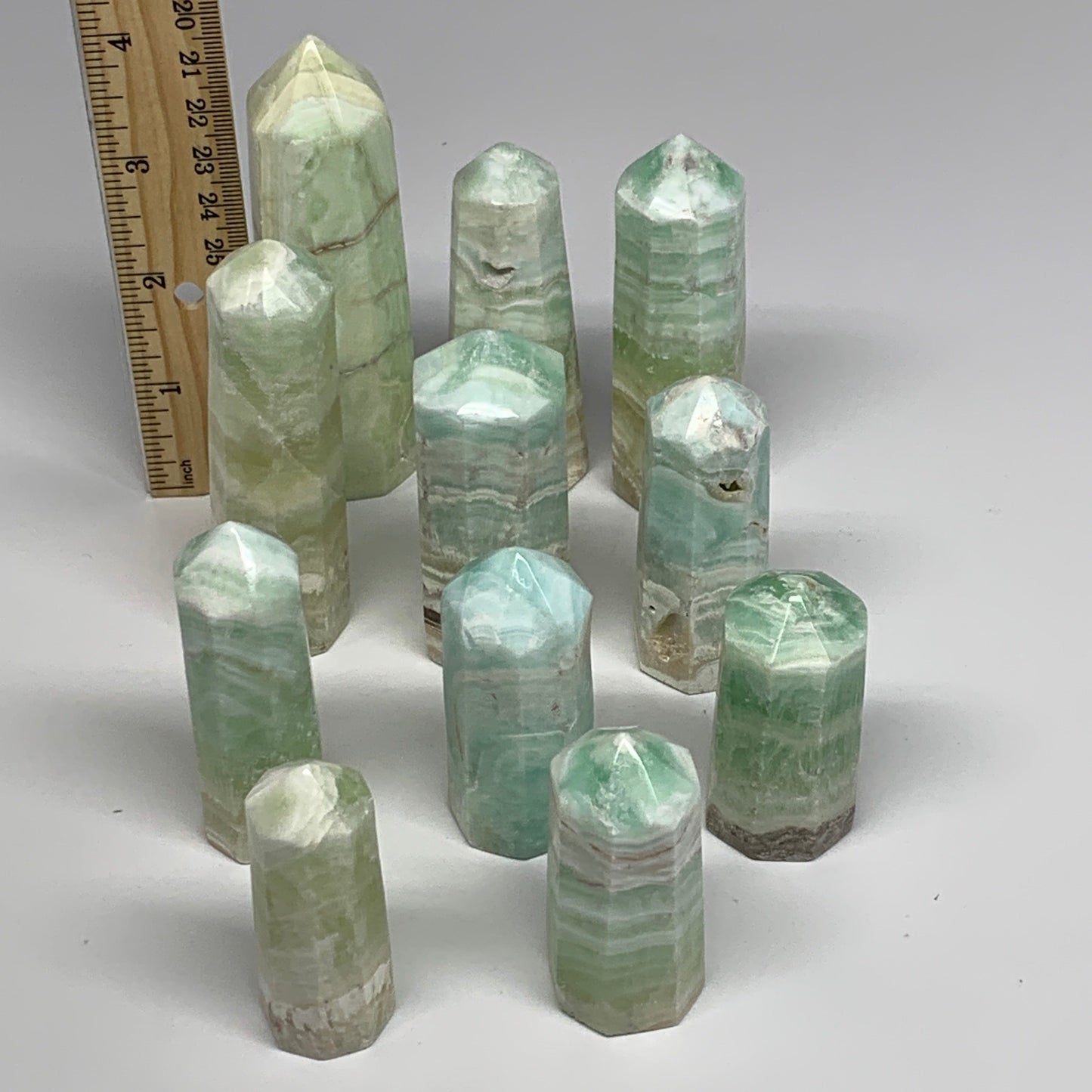 2.25 lbs, 2.2" - 4", 11 pcs, Caribbean Calcite Towers/Obelisks, B26380