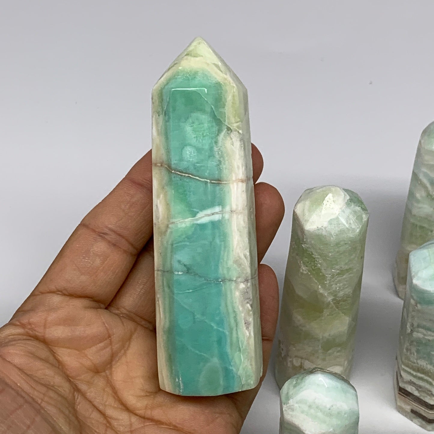 2.25 lbs, 2.2" - 4", 11 pcs, Caribbean Calcite Towers/Obelisks, B26380