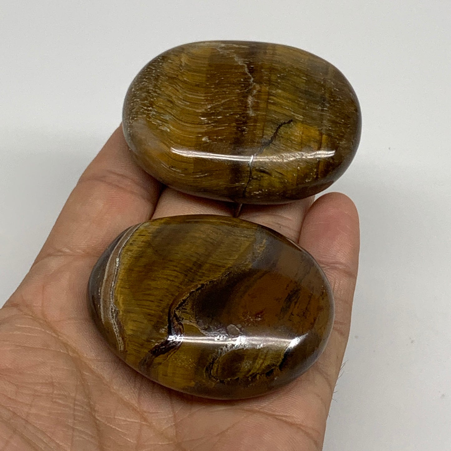 162.5g, 2.1"-2.2", 2pcs, Natural Tiger's Eye Palm-Stone Polished, B34825