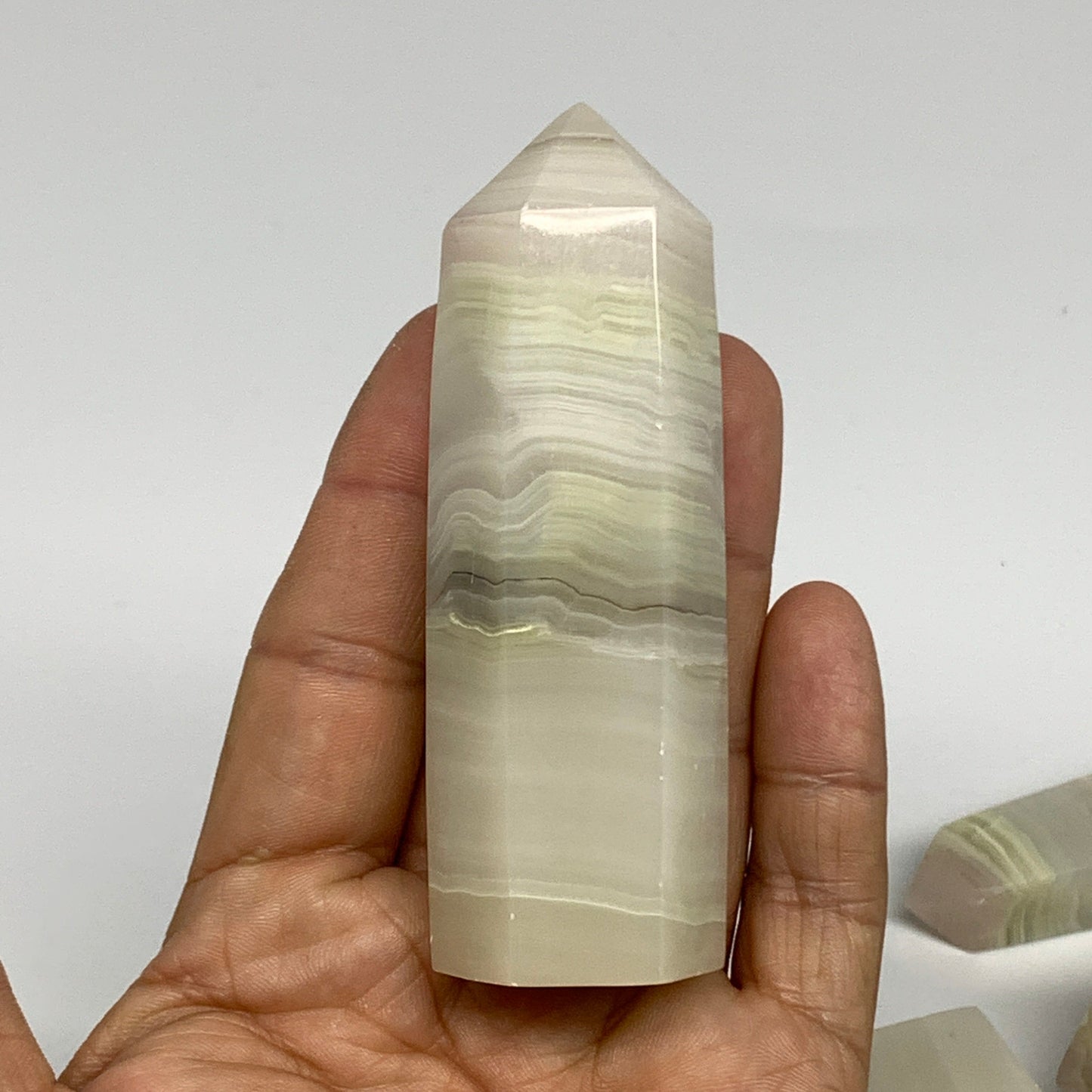 2.23 Lbs, 3" - 4", 7 pcs, Banded Onyx Towers/Obelisks, B25103