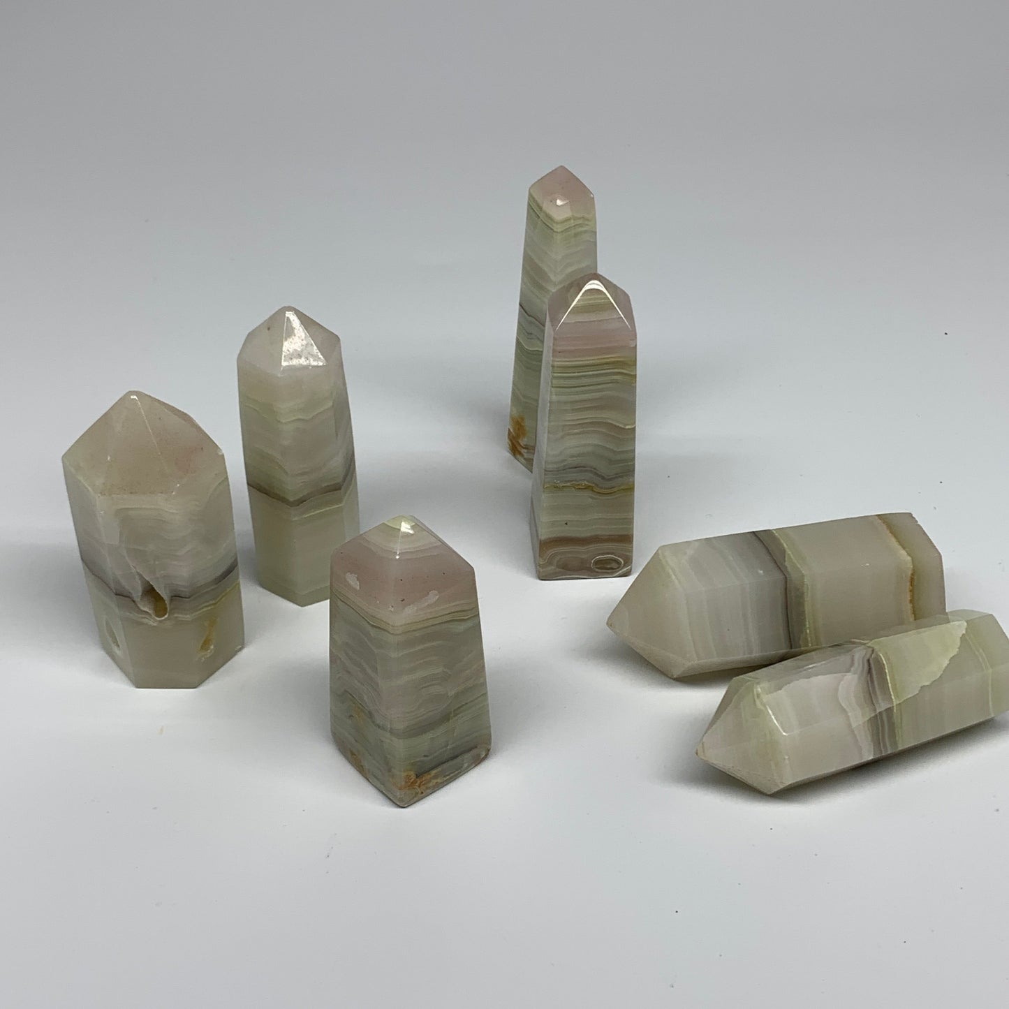 2.23 Lbs, 3" - 4", 7 pcs, Banded Onyx Towers/Obelisks, B25103