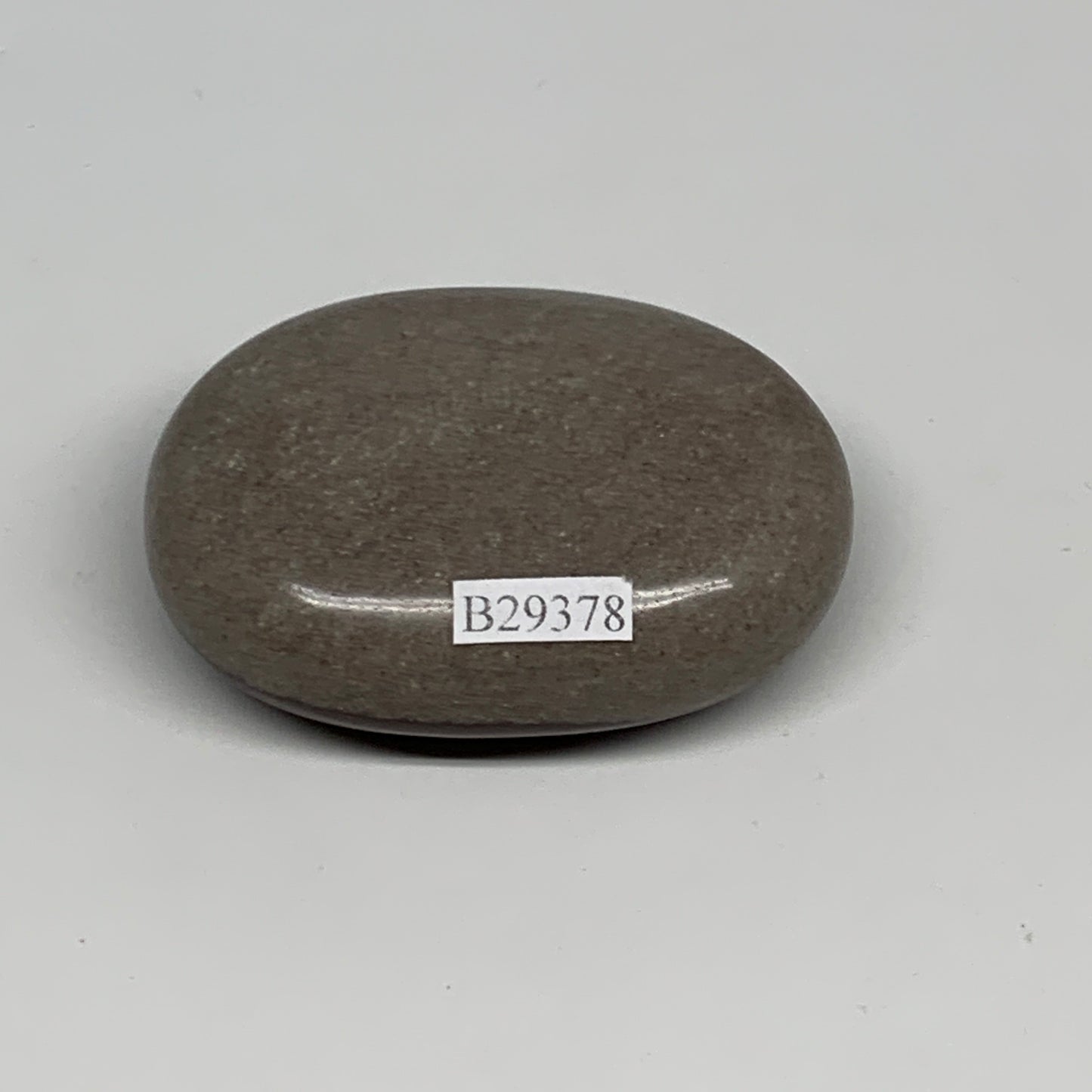 94.9g, 2.4"x1.7"x0.9", Narmada Shiva Lingam Palm-Stone Polished, B29378