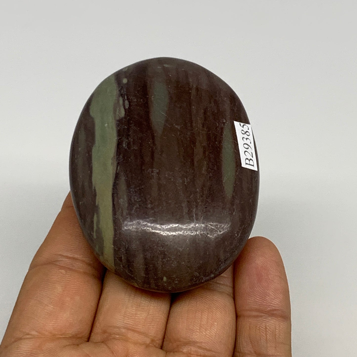 117.1g, 2.8"x2"x0.9", Narmada Shiva Lingam Palm-Stone Polished, B29385