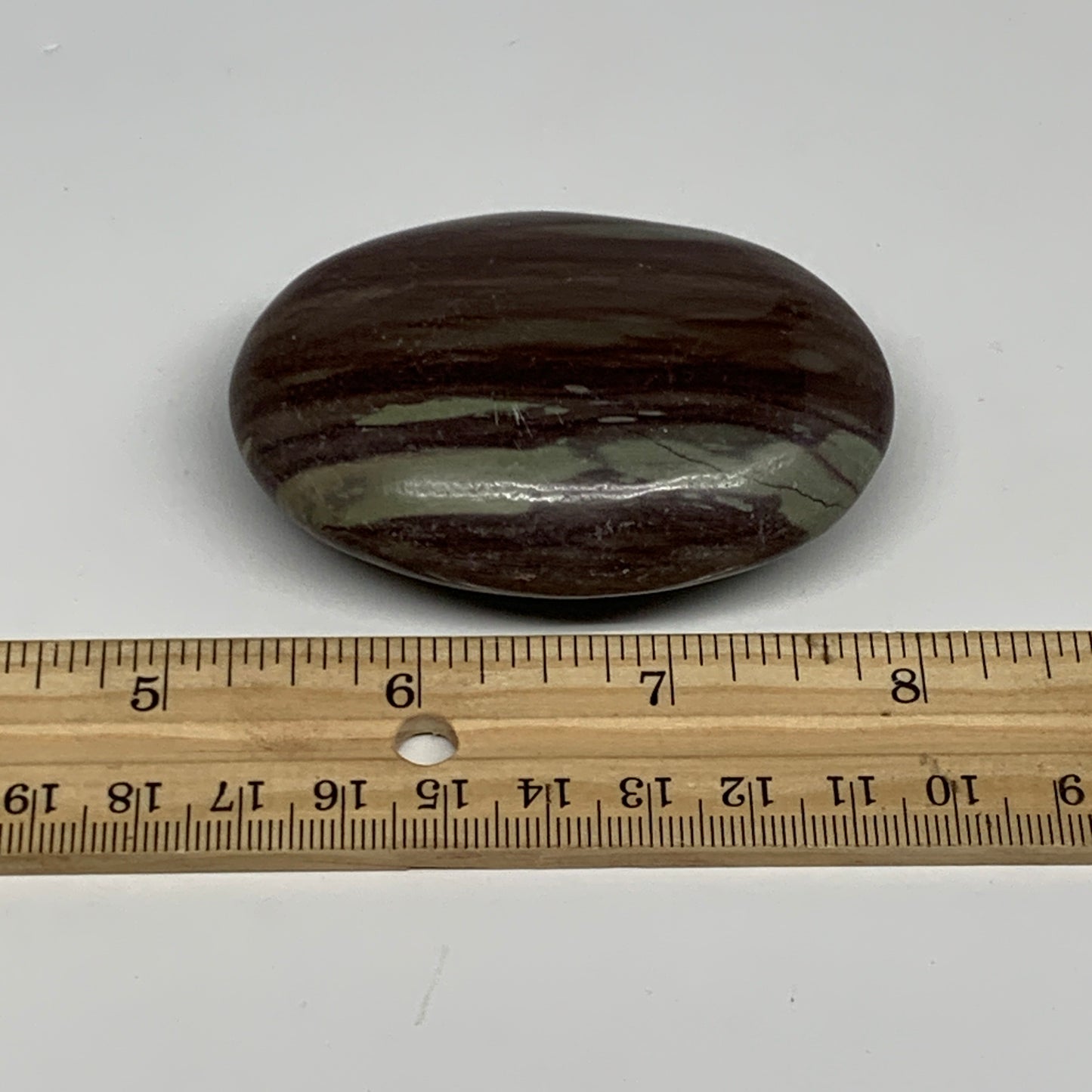 117.1g, 2.8"x2"x0.9", Narmada Shiva Lingam Palm-Stone Polished, B29385