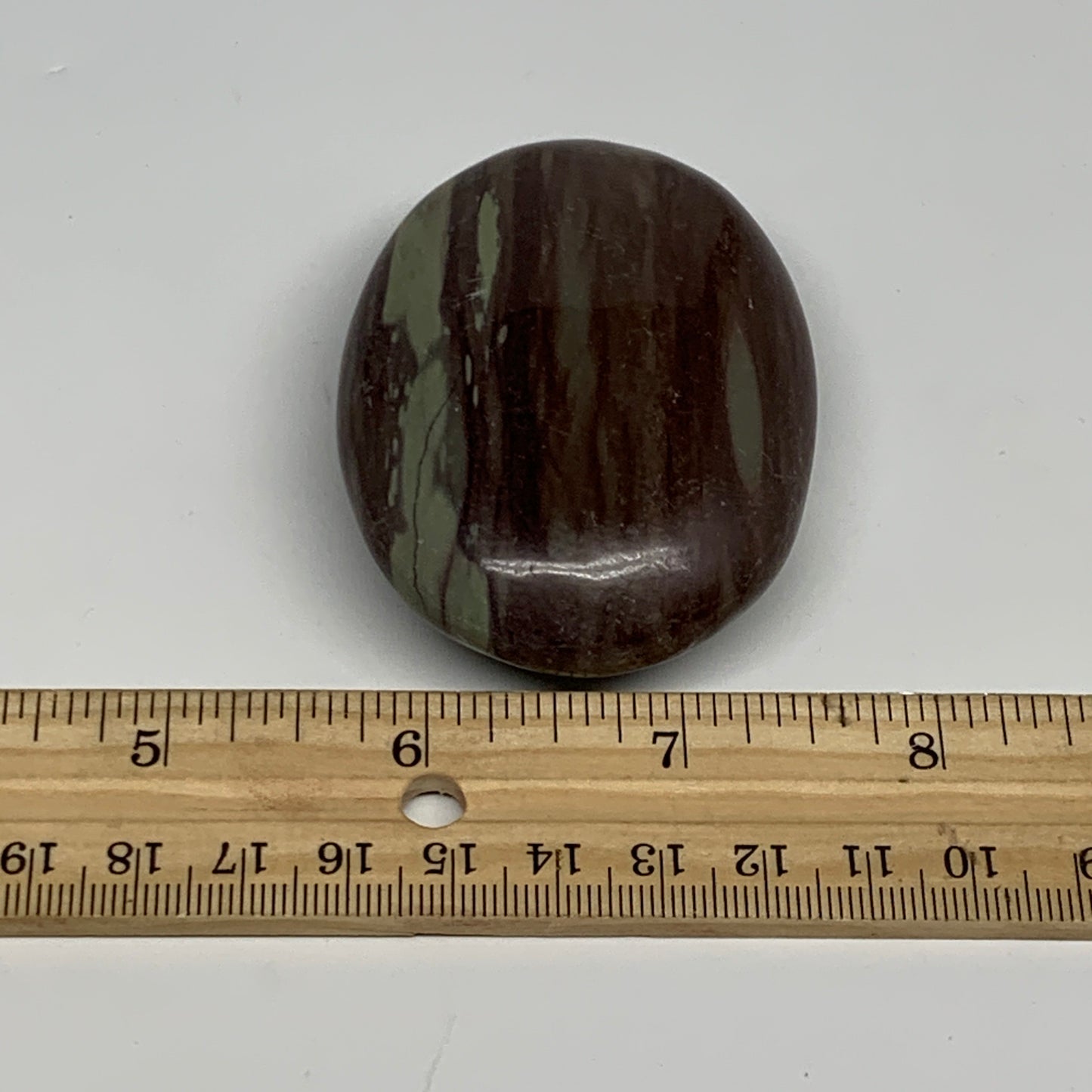 117.1g, 2.8"x2"x0.9", Narmada Shiva Lingam Palm-Stone Polished, B29385