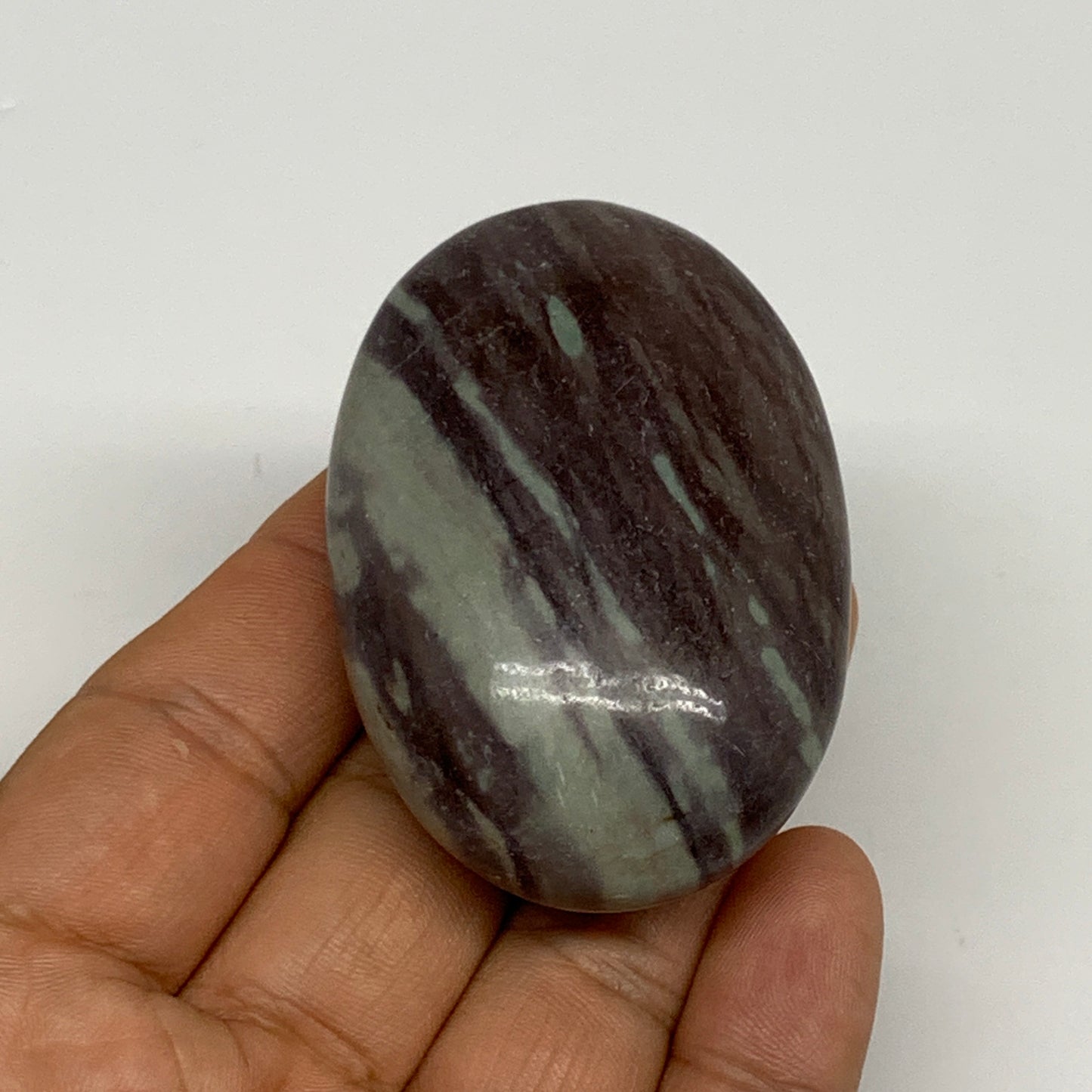 84.8g, 2.4"x1.6"x0.9", Narmada Shiva Lingam Palm-Stone Polished, B29387