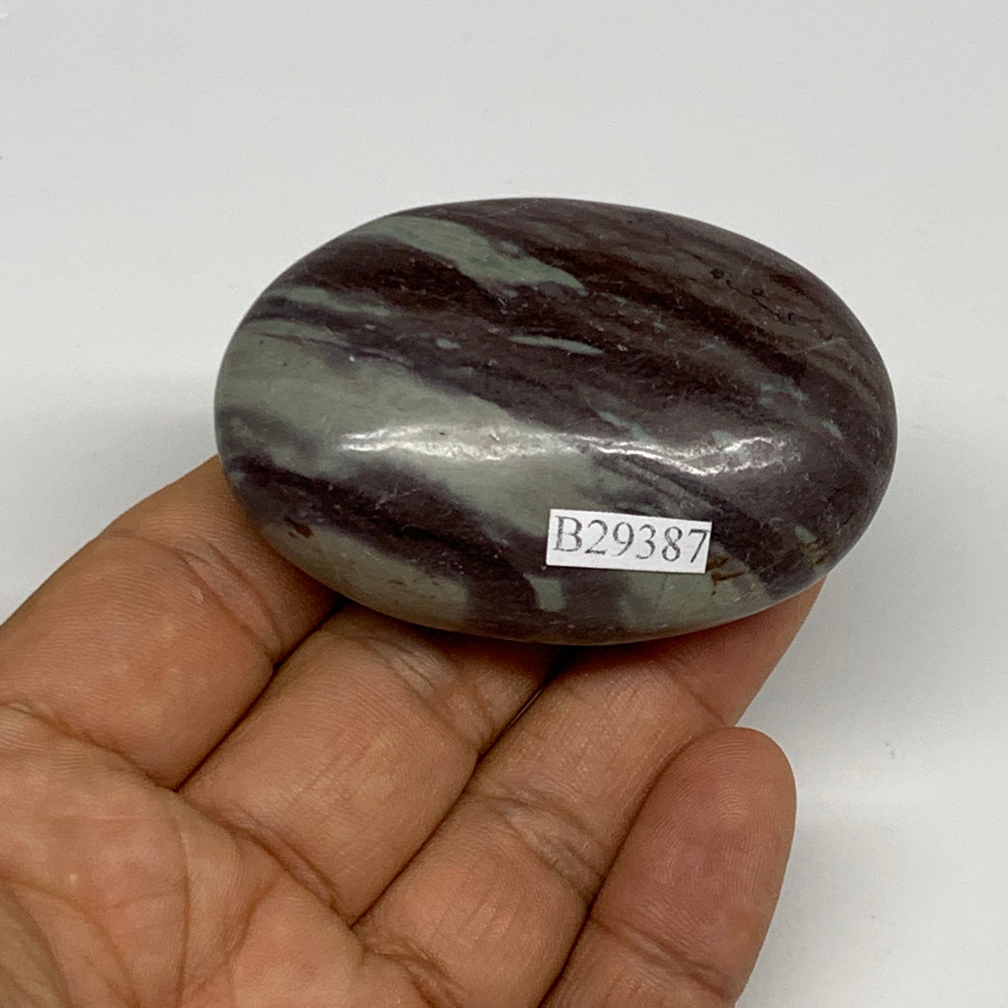 84.8g, 2.4"x1.6"x0.9", Narmada Shiva Lingam Palm-Stone Polished, B29387