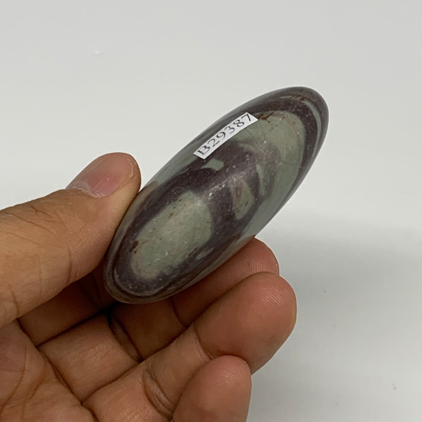 84.8g, 2.4"x1.6"x0.9", Narmada Shiva Lingam Palm-Stone Polished, B29387