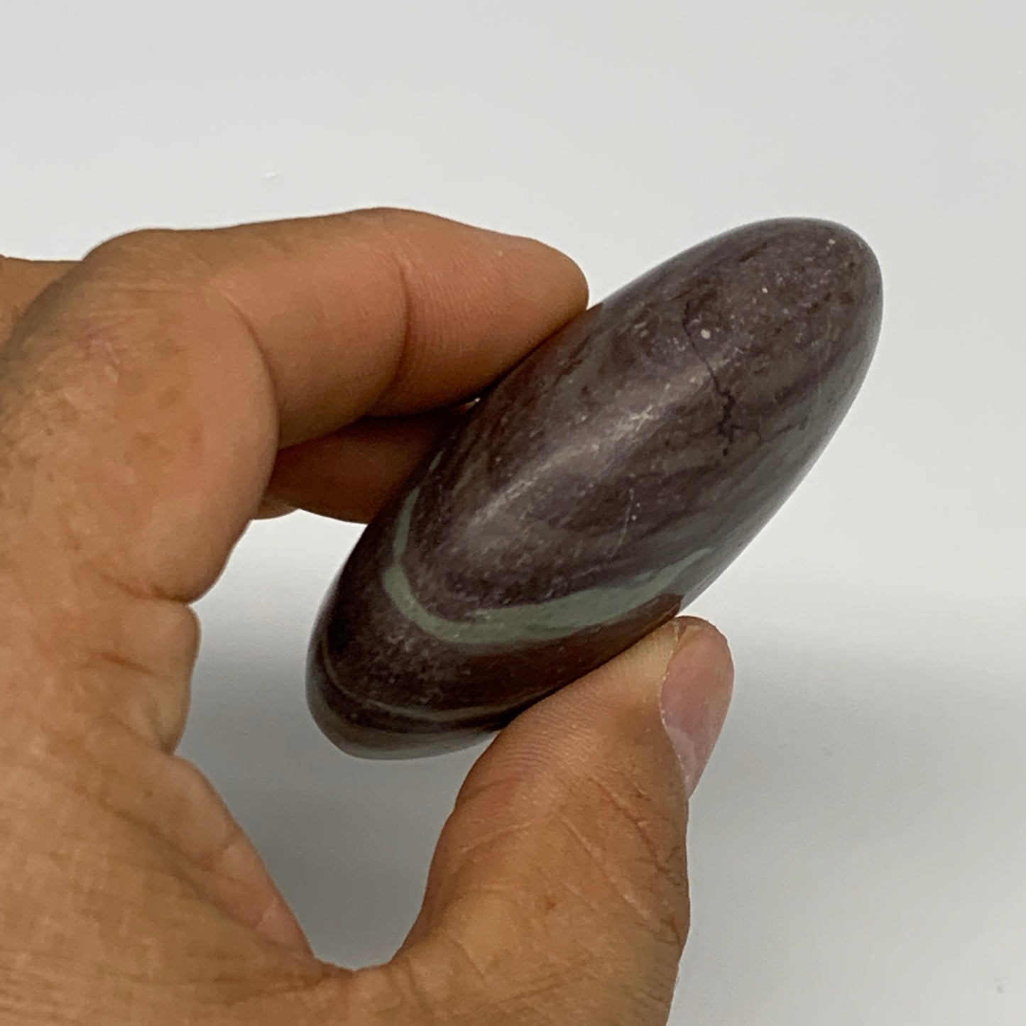 84.8g, 2.4"x1.6"x0.9", Narmada Shiva Lingam Palm-Stone Polished, B29387