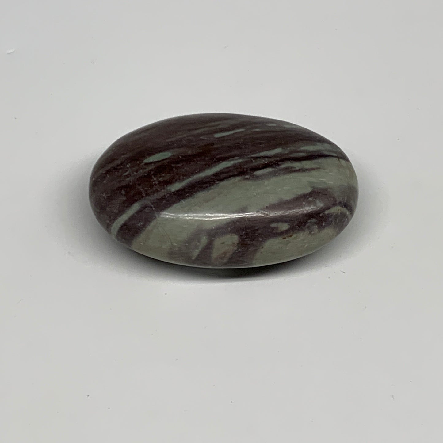 84.8g, 2.4"x1.6"x0.9", Narmada Shiva Lingam Palm-Stone Polished, B29387