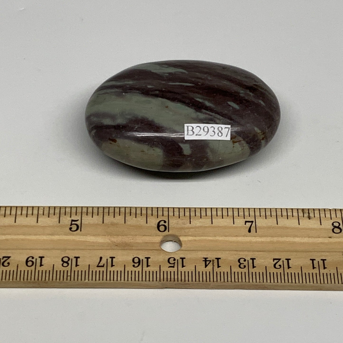 84.8g, 2.4"x1.6"x0.9", Narmada Shiva Lingam Palm-Stone Polished, B29387