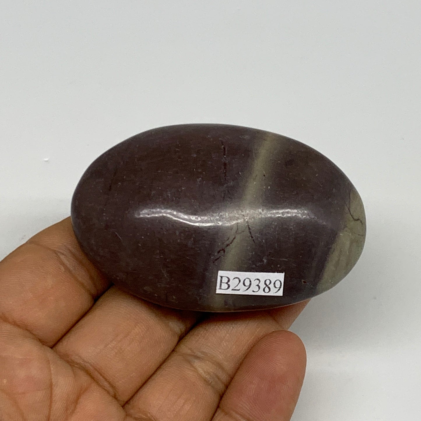 81.3g, 2.5"x1.6"x0.9", Narmada Shiva Lingam Palm-Stone Polished, B29389