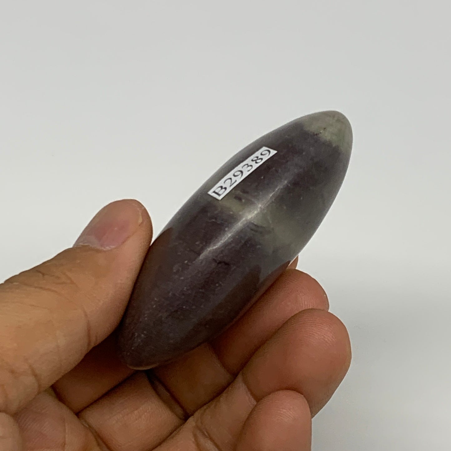 81.3g, 2.5"x1.6"x0.9", Narmada Shiva Lingam Palm-Stone Polished, B29389