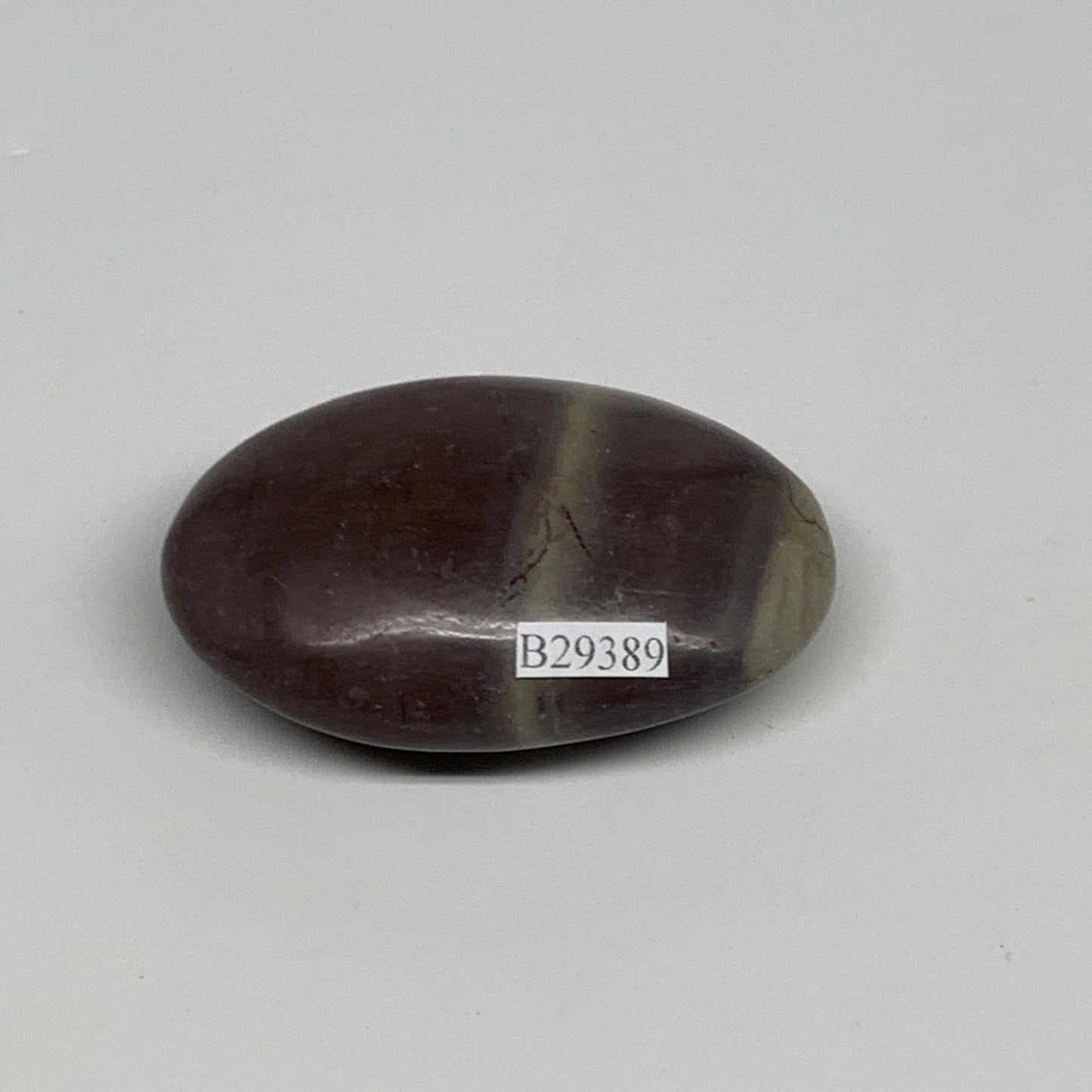 81.3g, 2.5"x1.6"x0.9", Narmada Shiva Lingam Palm-Stone Polished, B29389