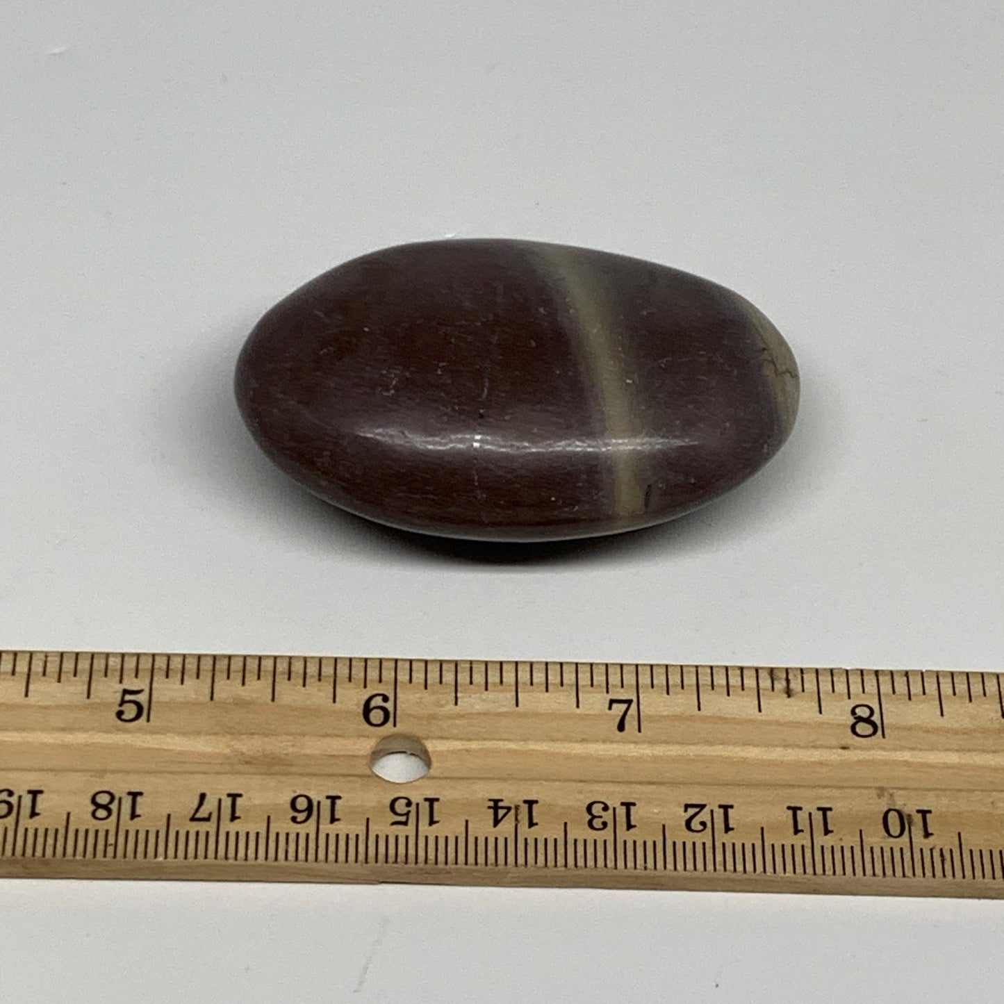 81.3g, 2.5"x1.6"x0.9", Narmada Shiva Lingam Palm-Stone Polished, B29389