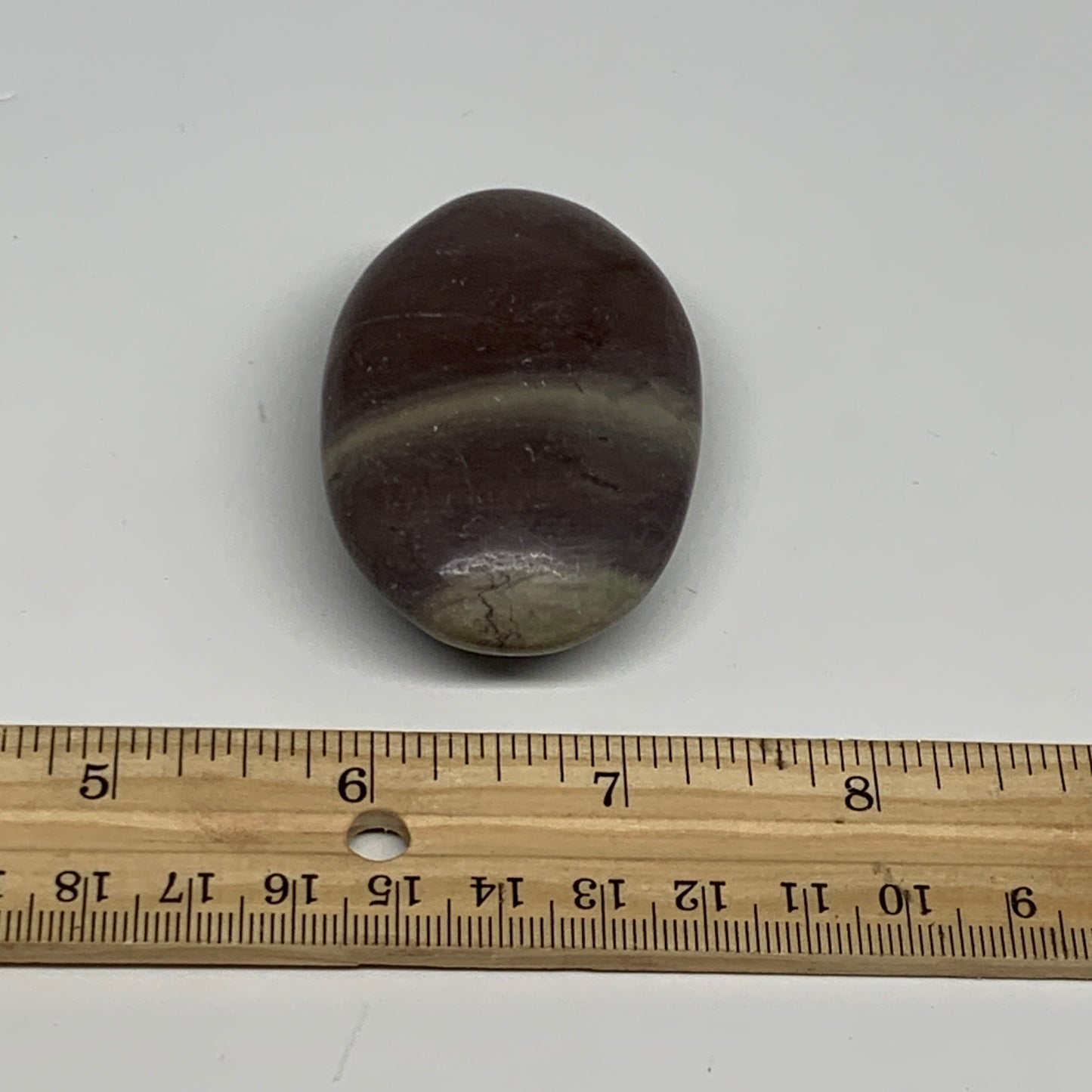 81.3g, 2.5"x1.6"x0.9", Narmada Shiva Lingam Palm-Stone Polished, B29389