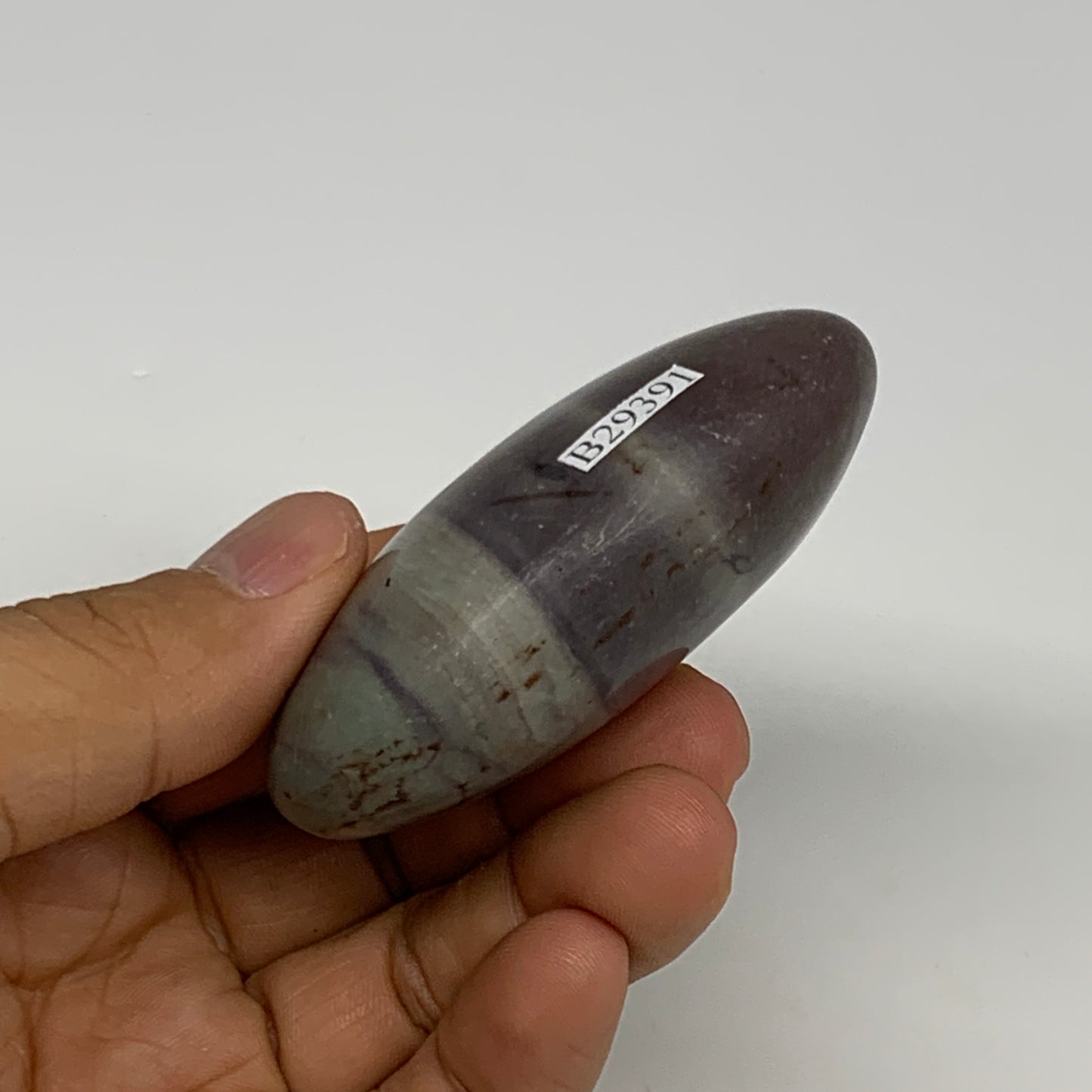 102.5g, 2.6"x1.7"x1", Narmada Shiva Lingam Palm-Stone Polished, B29391