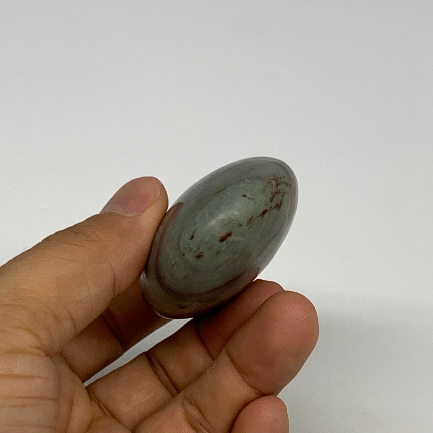 102.5g, 2.6"x1.7"x1", Narmada Shiva Lingam Palm-Stone Polished, B29391