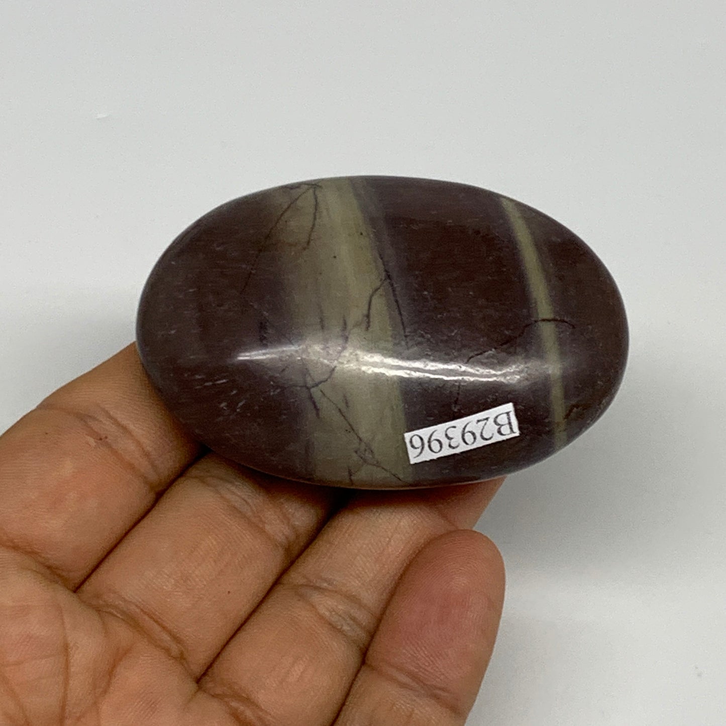 96.3g, 2.5"x1.7"x0.9", Narmada Shiva Lingam Palm-Stone Polished, B29396