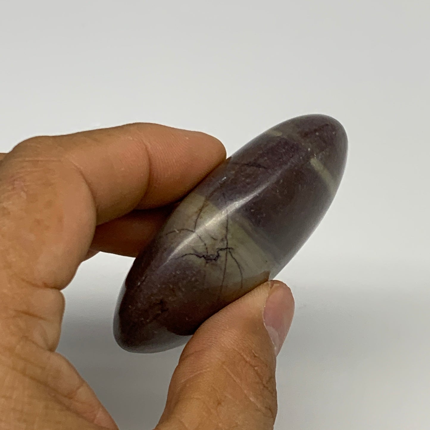 96.3g, 2.5"x1.7"x0.9", Narmada Shiva Lingam Palm-Stone Polished, B29396