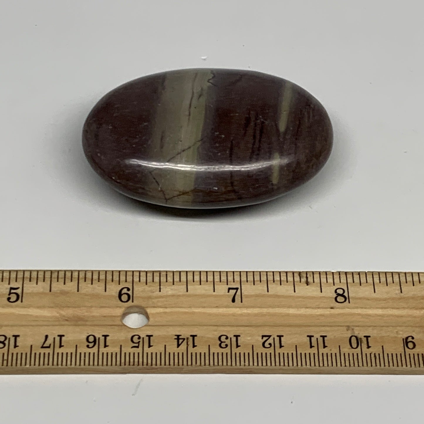 96.3g, 2.5"x1.7"x0.9", Narmada Shiva Lingam Palm-Stone Polished, B29396