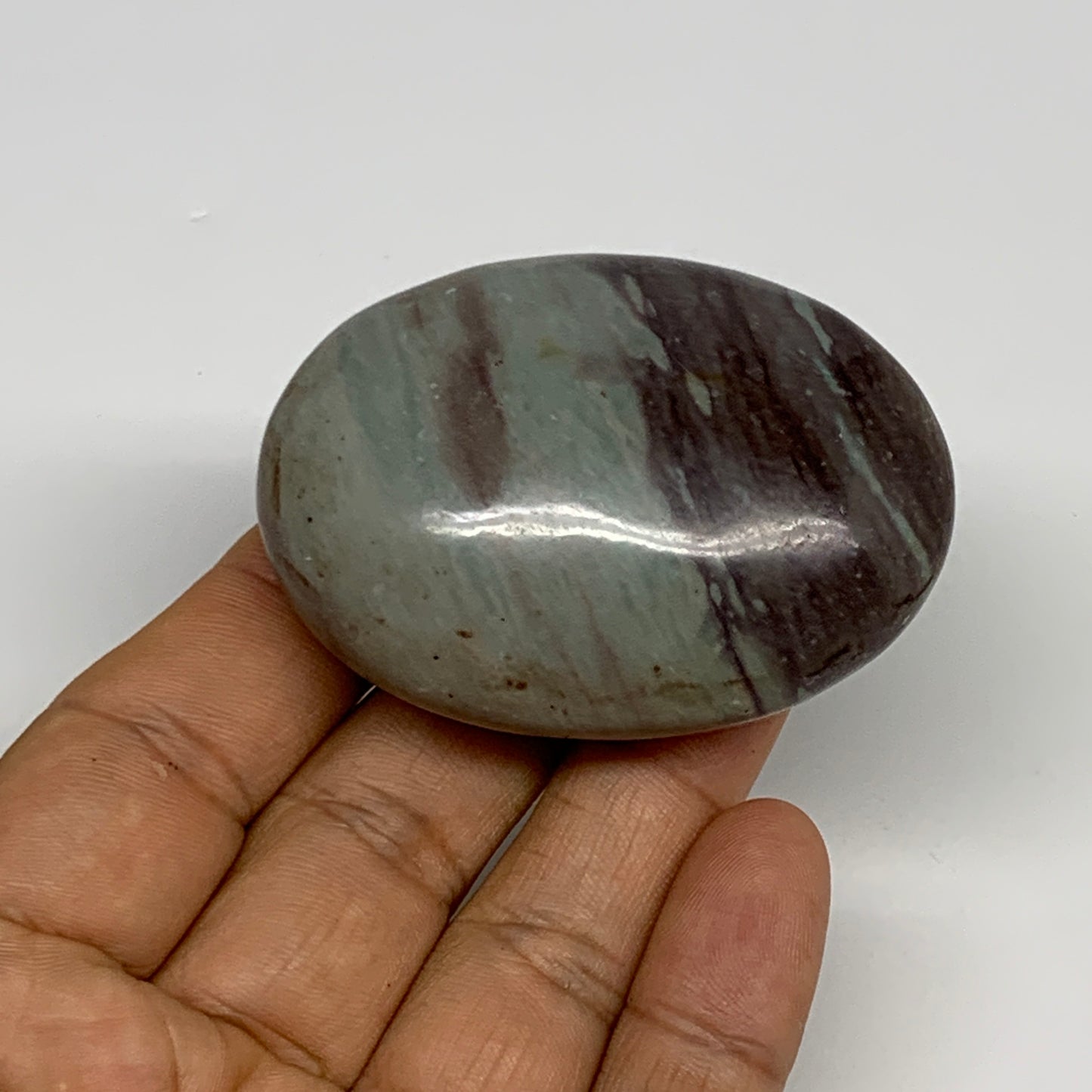 92.77g, 2.3"x1.7"x1", Narmada Shiva Lingam Palm-Stone Polished, B29397