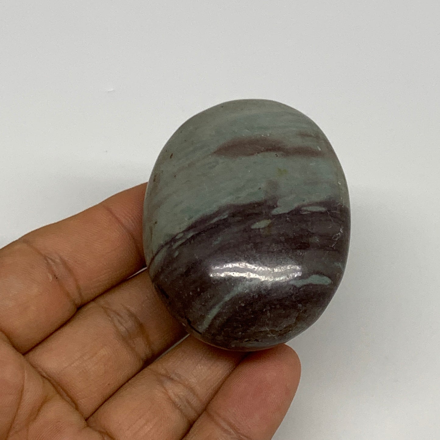 92.77g, 2.3"x1.7"x1", Narmada Shiva Lingam Palm-Stone Polished, B29397