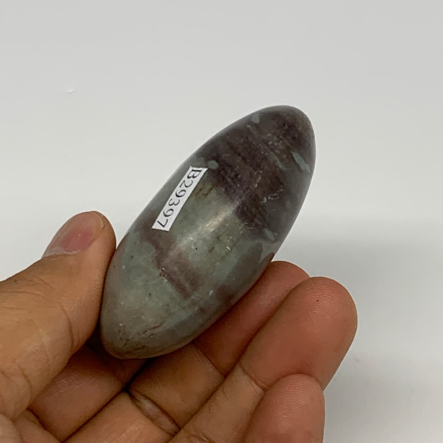 92.77g, 2.3"x1.7"x1", Narmada Shiva Lingam Palm-Stone Polished, B29397