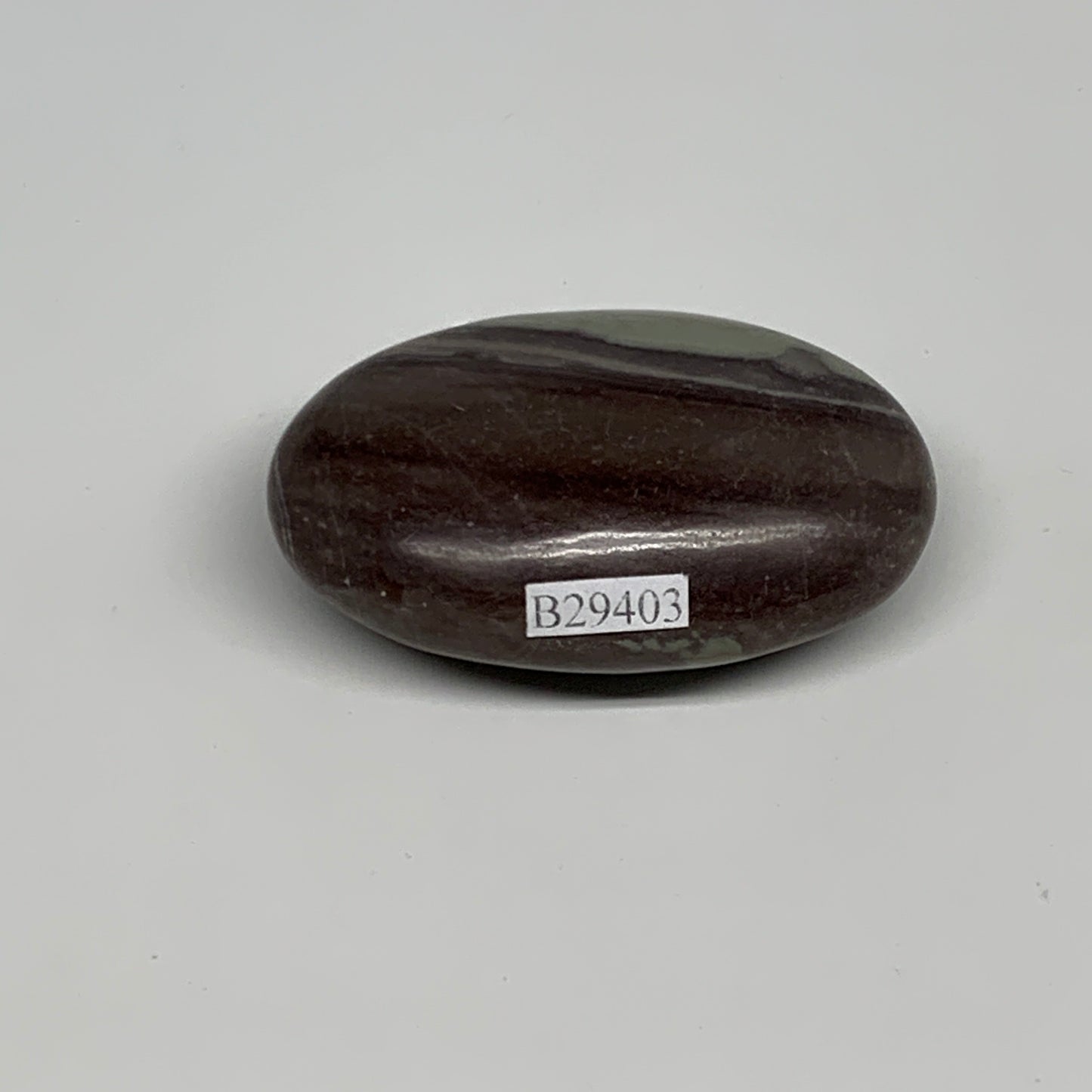 78.8g,  2.4"x1.5"x0.9", Narmada Shiva Lingam Palm-Stone Polished, B29403