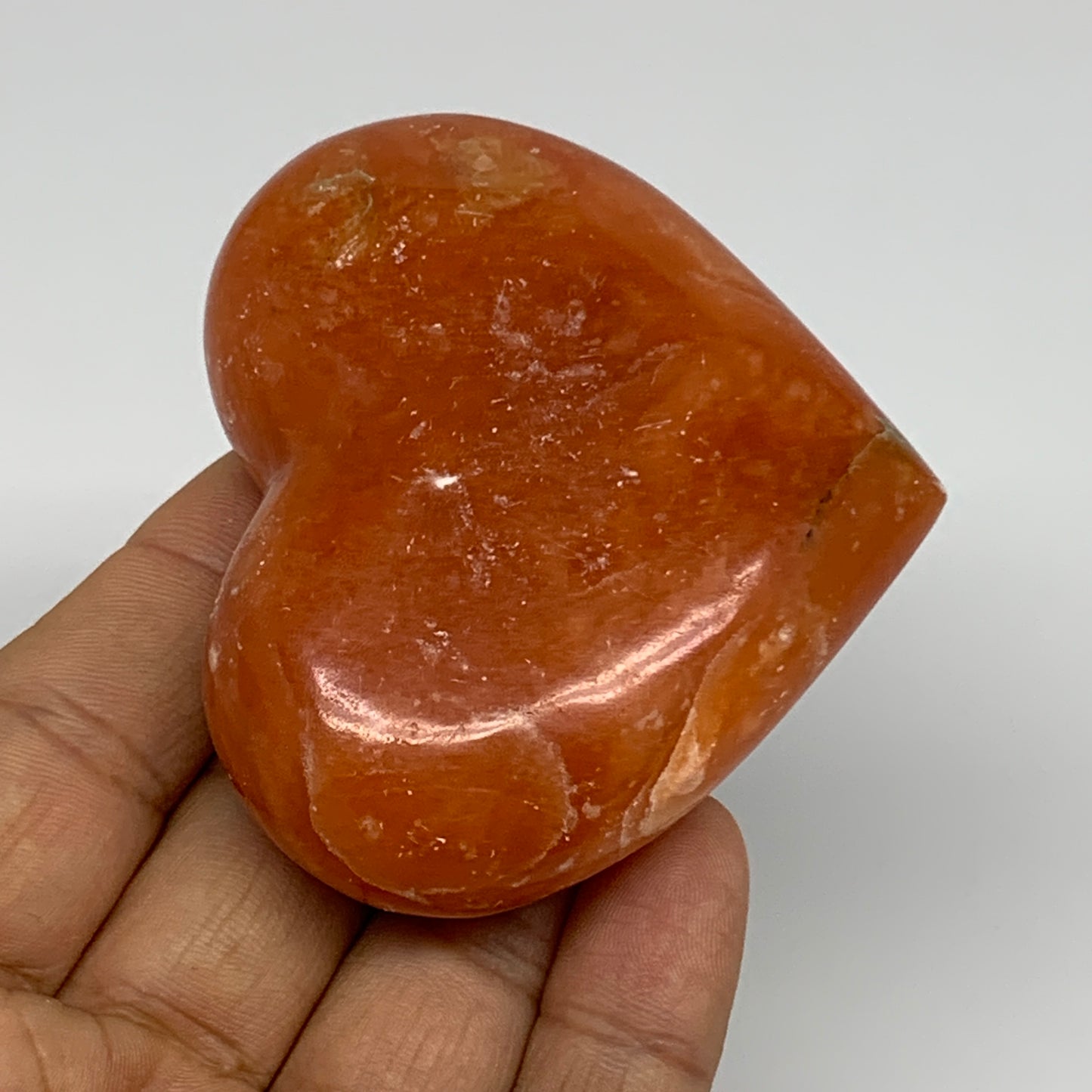 123.5g, 2.3"x2.7"x1" Orange Calcite Heart Gemstones from Madagascar, B33768