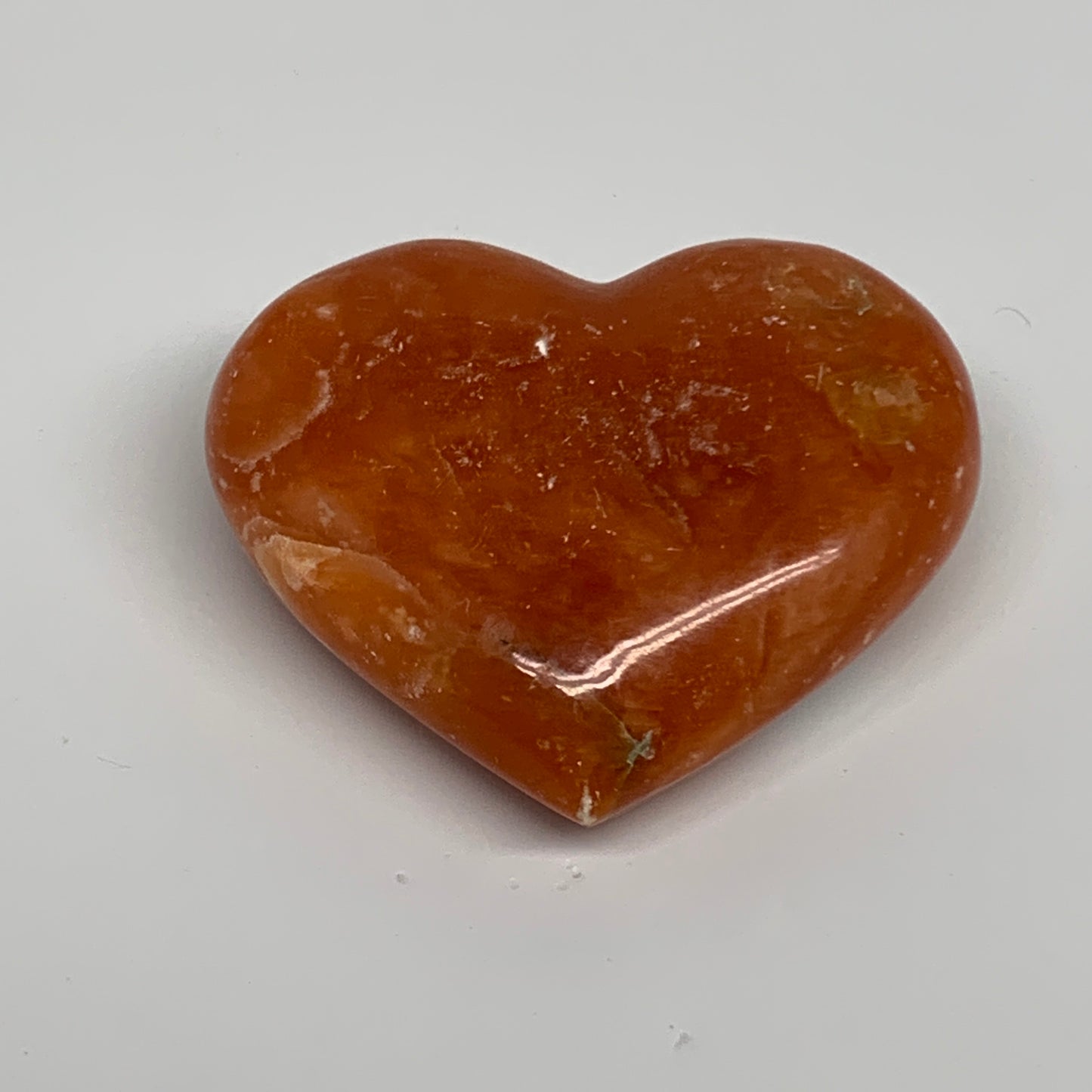 123.5g, 2.3"x2.7"x1" Orange Calcite Heart Gemstones from Madagascar, B33768