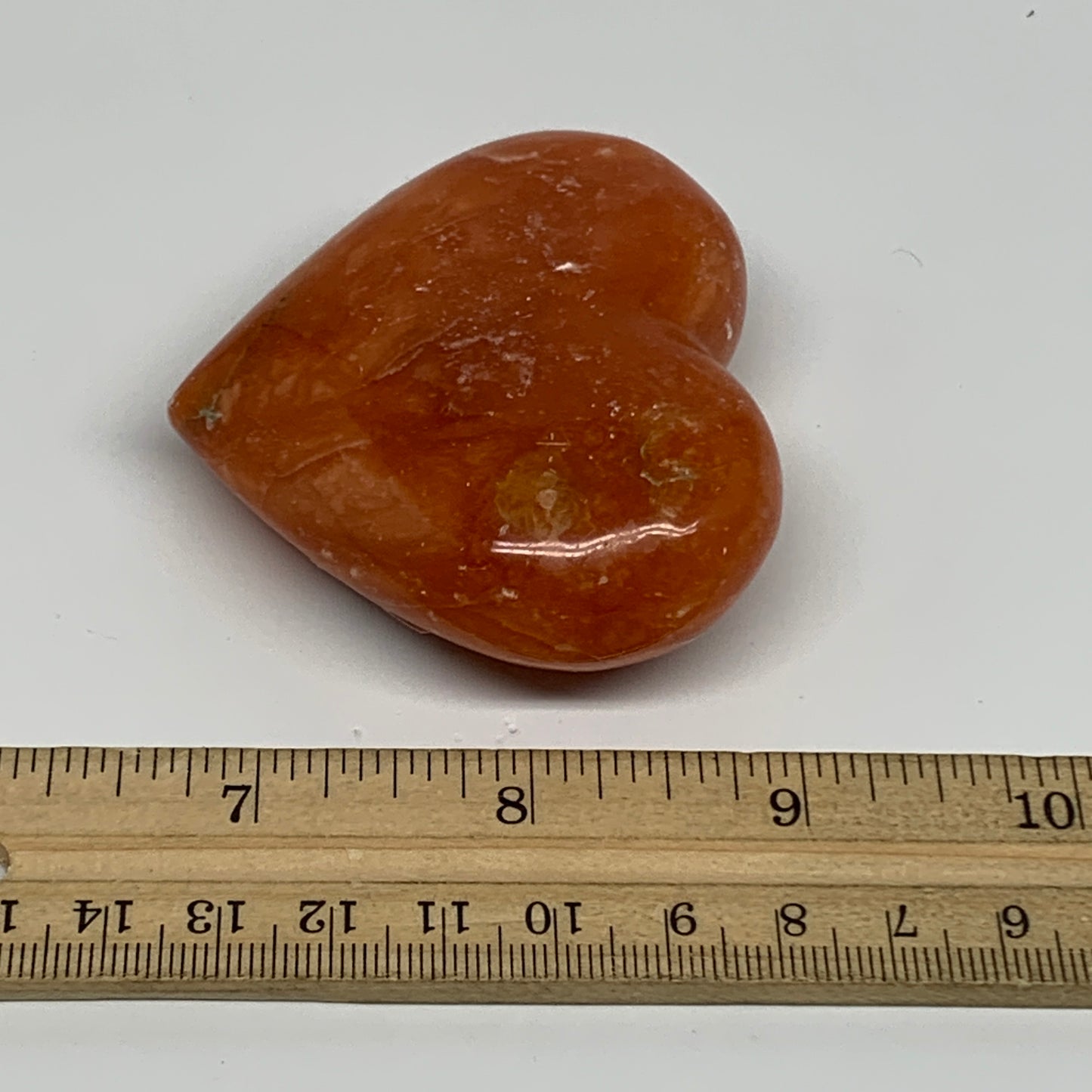 123.5g, 2.3"x2.7"x1" Orange Calcite Heart Gemstones from Madagascar, B33768