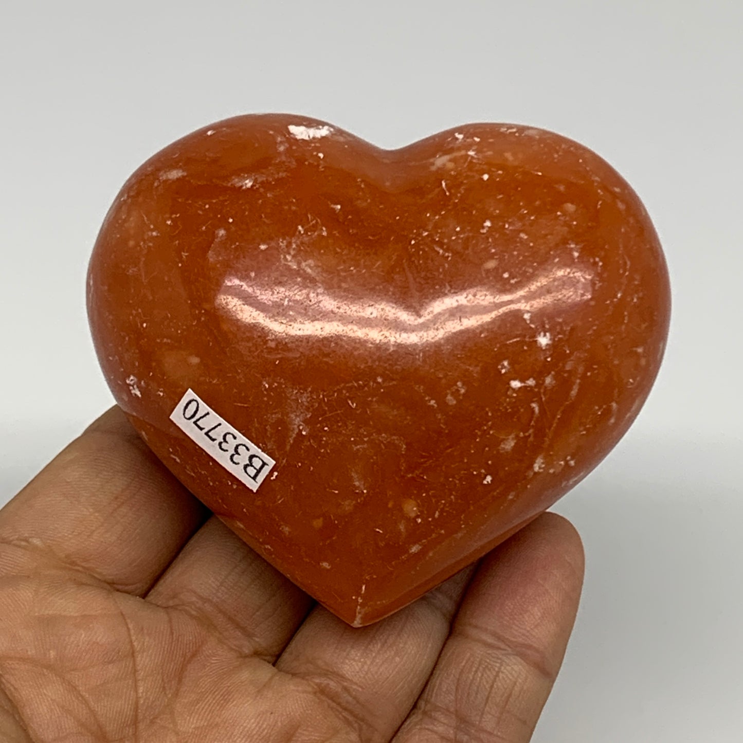 220g, 2.5"x2.9"x1.6" Orange Calcite Heart Gemstones from Madagascar, B33770