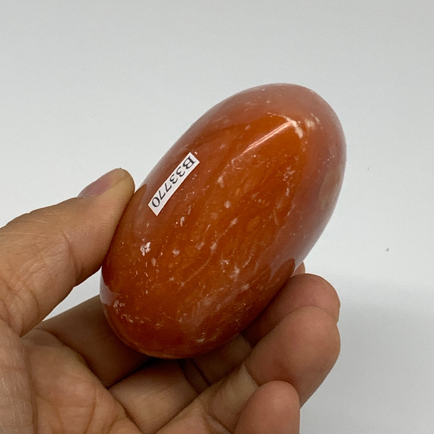 220g, 2.5"x2.9"x1.6" Orange Calcite Heart Gemstones from Madagascar, B33770