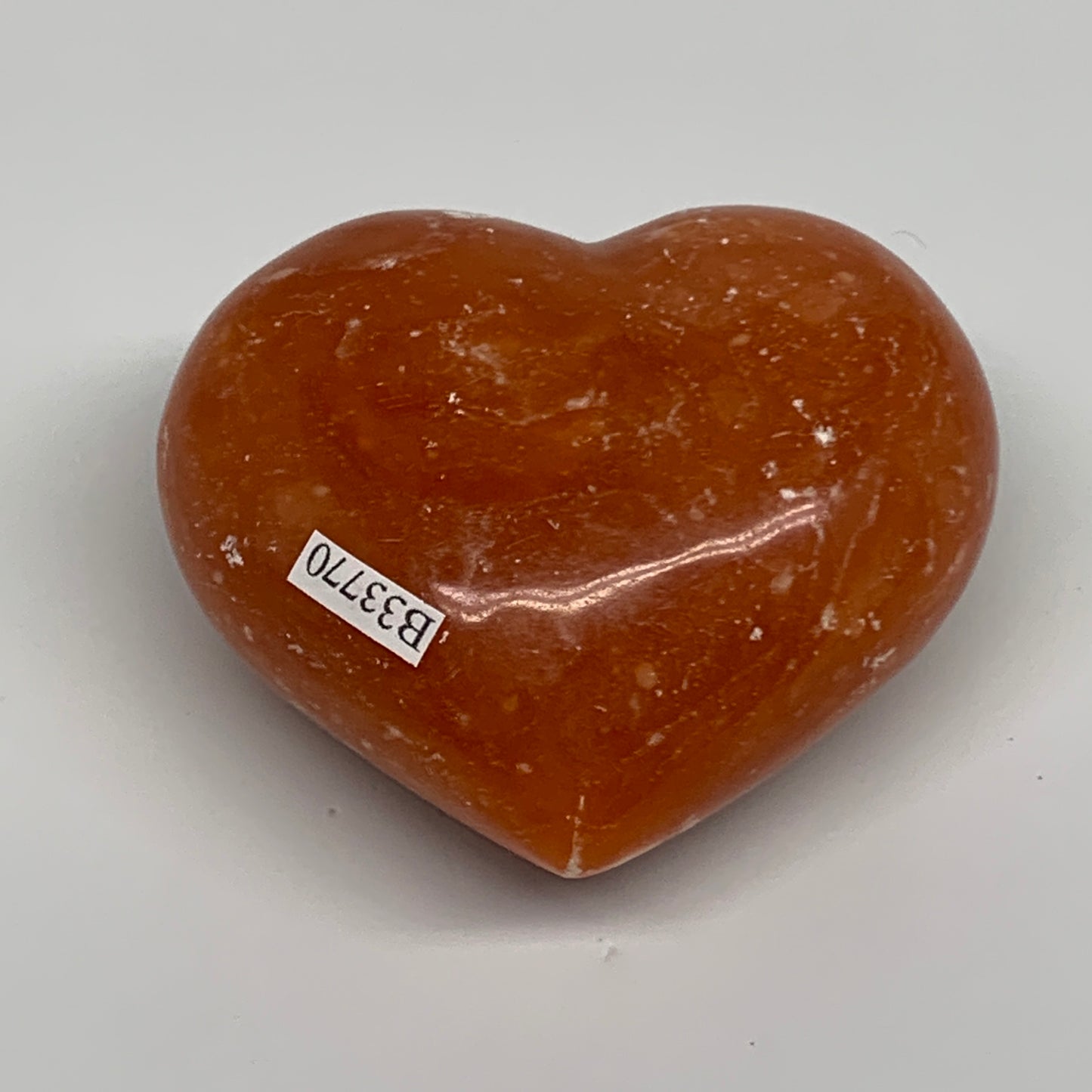 220g, 2.5"x2.9"x1.6" Orange Calcite Heart Gemstones from Madagascar, B33770