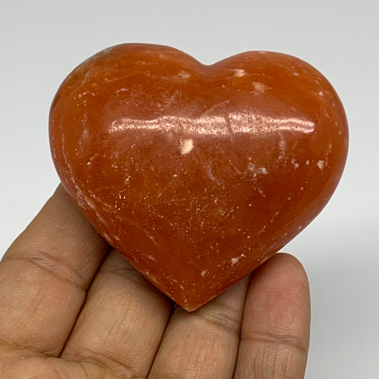 117.8g, 2.2"x2.5"x1.1" Orange Calcite Heart Gemstones from Madagascar, B33777