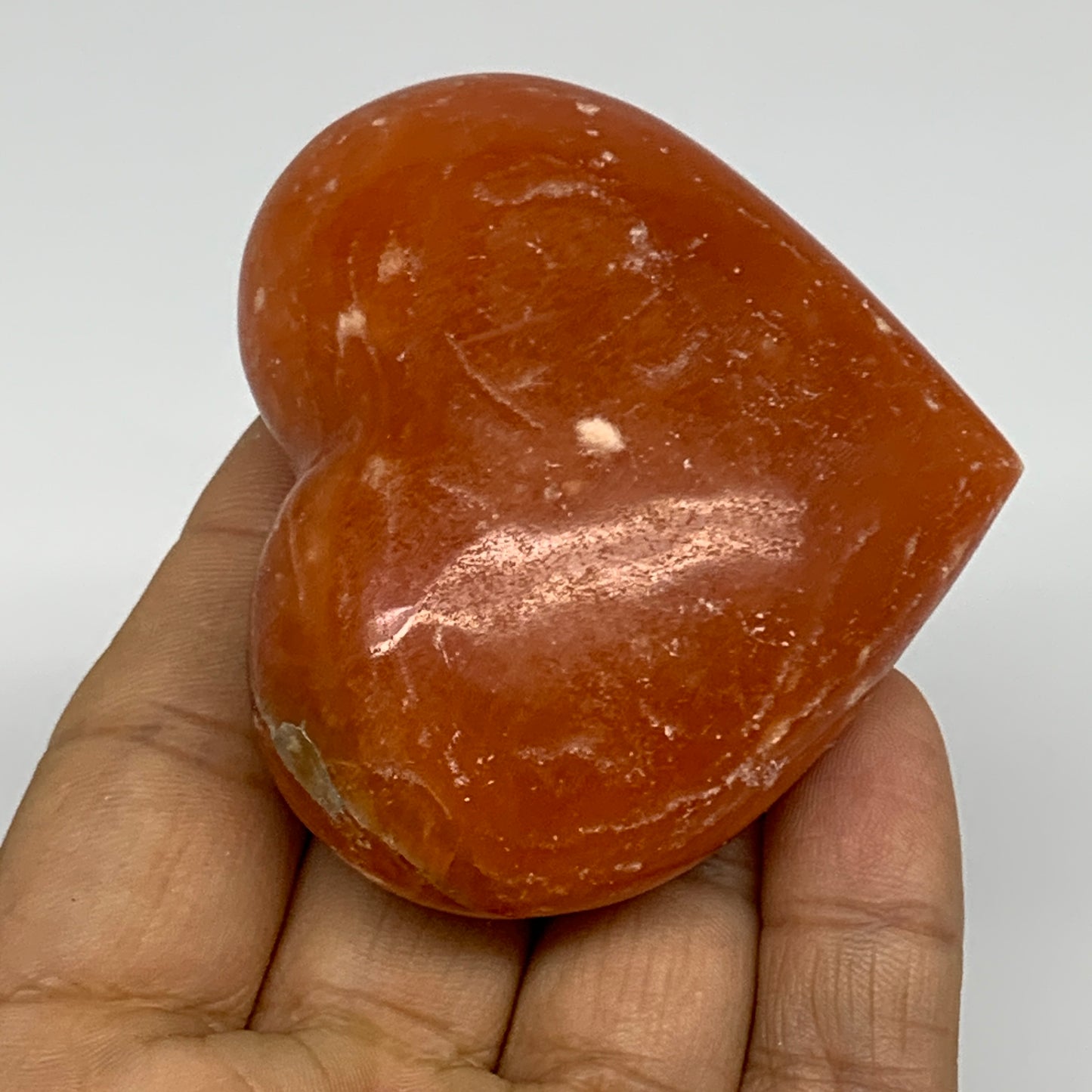 117.8g, 2.2"x2.5"x1.1" Orange Calcite Heart Gemstones from Madagascar, B33777