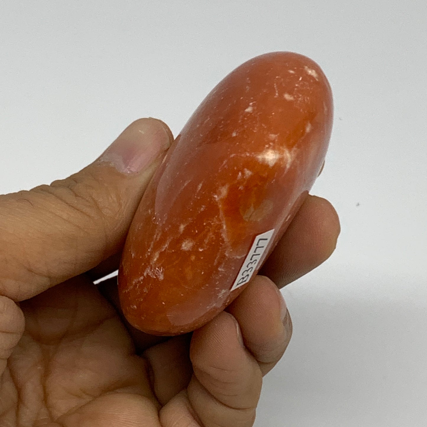 117.8g, 2.2"x2.5"x1.1" Orange Calcite Heart Gemstones from Madagascar, B33777