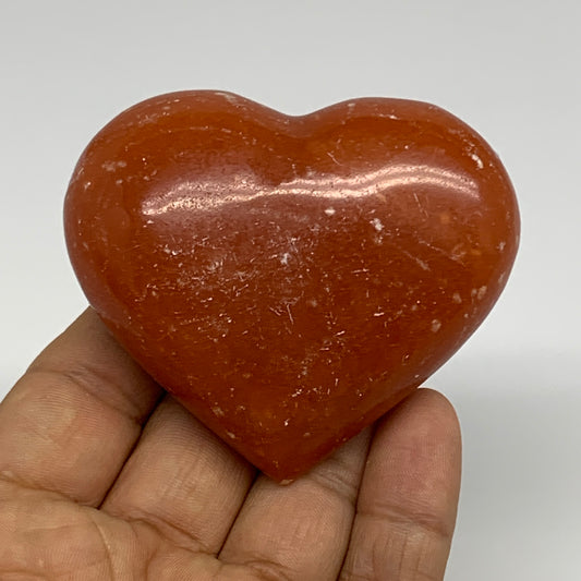 126.9g, 2.2"x2.7"x1.1" Orange Calcite Heart Gemstones from Madagascar, B33779