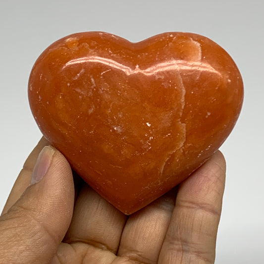 109.9g, 2.2"x2.6"x1" Orange Calcite Heart Gemstones from Madagascar, B33784