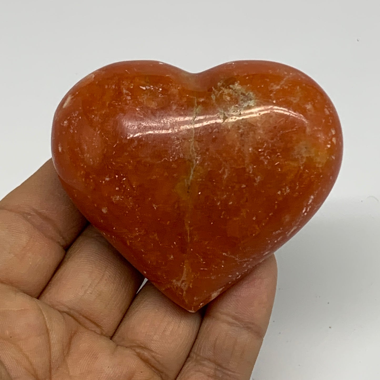 131.3g, 2.3"x2.7"x1.2" Orange Calcite Heart Gemstones from Madagascar, B33788