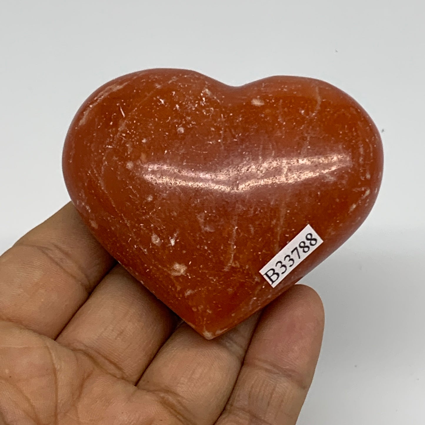 131.3g, 2.3"x2.7"x1.2" Orange Calcite Heart Gemstones from Madagascar, B33788