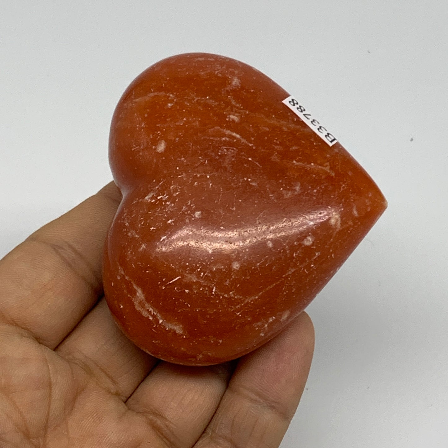 131.3g, 2.3"x2.7"x1.2" Orange Calcite Heart Gemstones from Madagascar, B33788