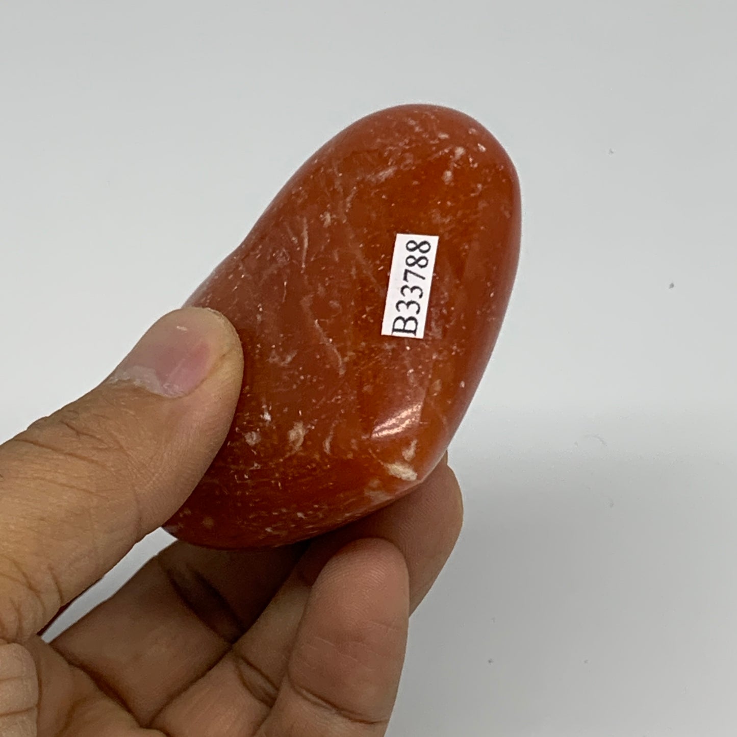 131.3g, 2.3"x2.7"x1.2" Orange Calcite Heart Gemstones from Madagascar, B33788