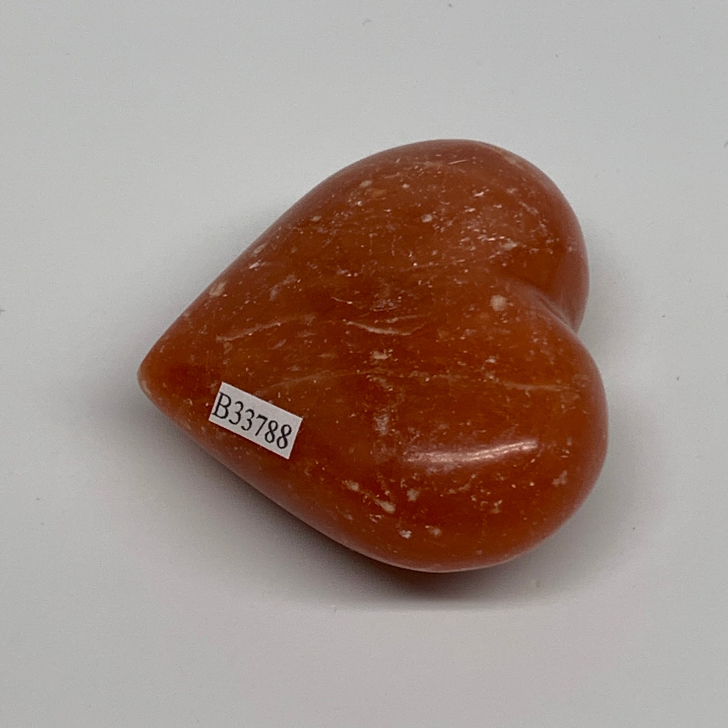 131.3g, 2.3"x2.7"x1.2" Orange Calcite Heart Gemstones from Madagascar, B33788