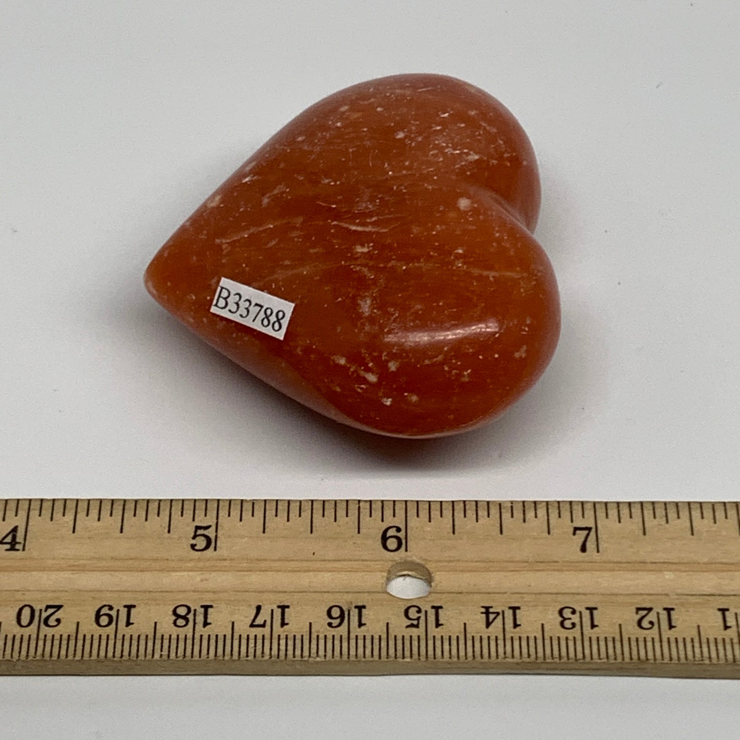 131.3g, 2.3"x2.7"x1.2" Orange Calcite Heart Gemstones from Madagascar, B33788