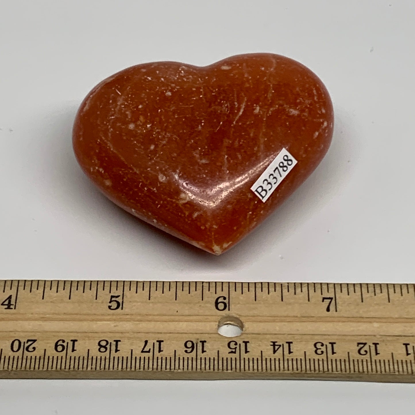 131.3g, 2.3"x2.7"x1.2" Orange Calcite Heart Gemstones from Madagascar, B33788