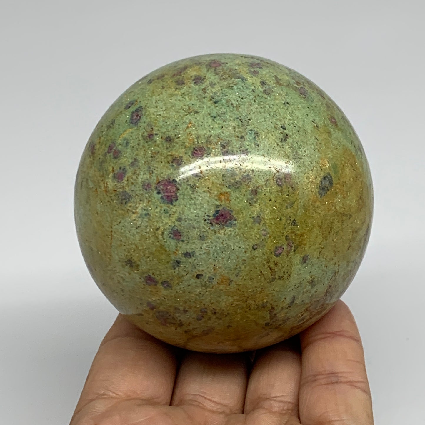 1.26 lbs, 2.8"(72mm), Zoisite with Ruby Sphere Sphere Ball Crystal, B25208